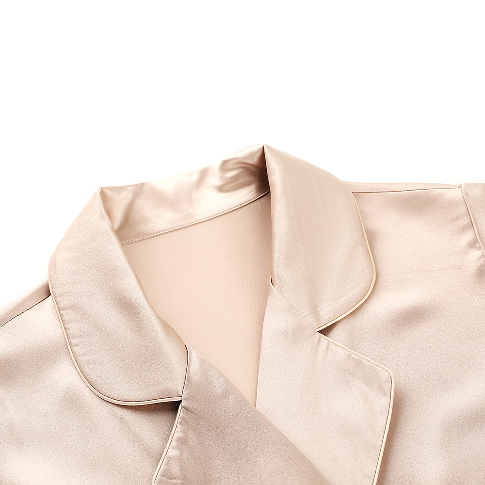Notch lapel collar detail on champagne silk bathrobe