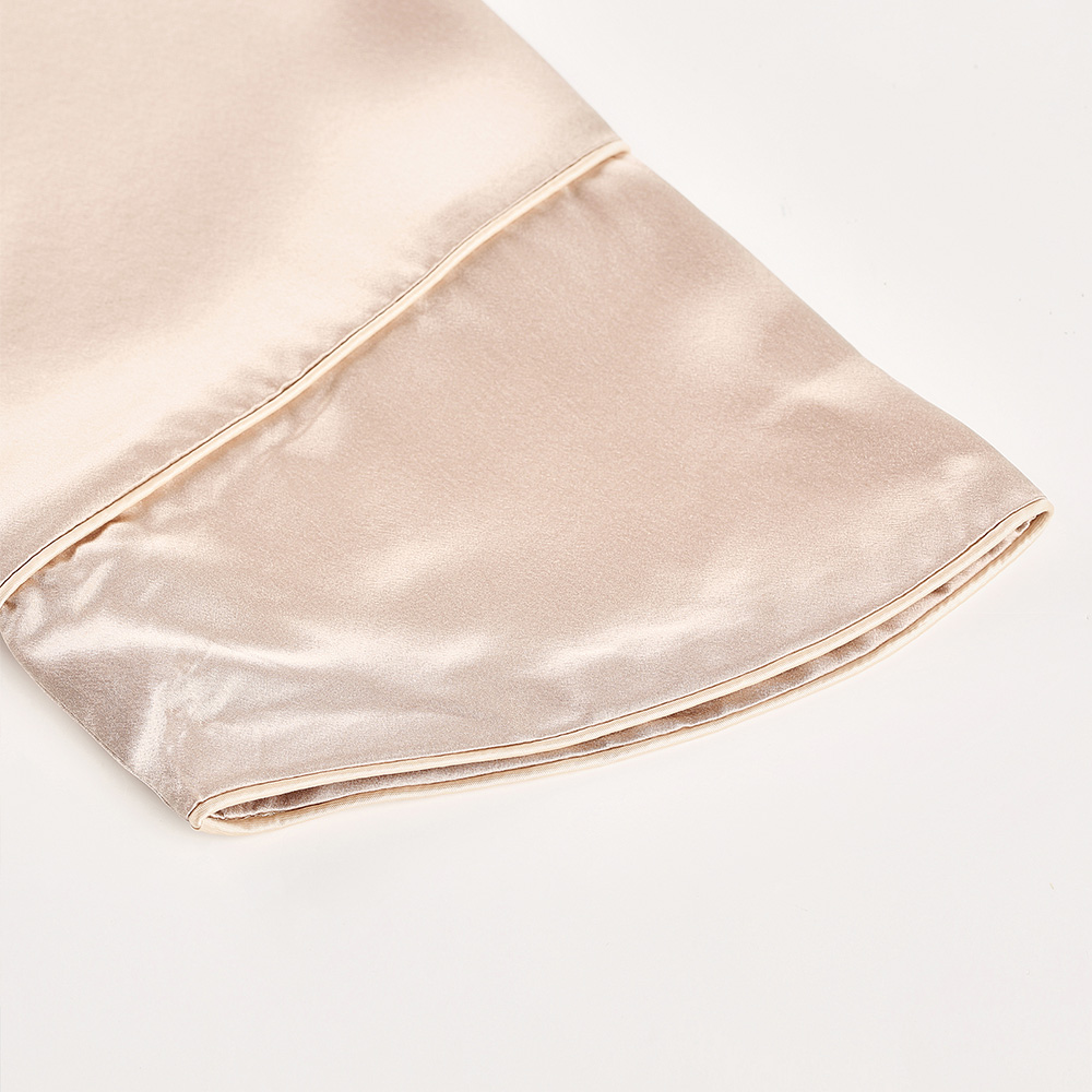 Sleeve cuff detail of champagne silk bathrobe