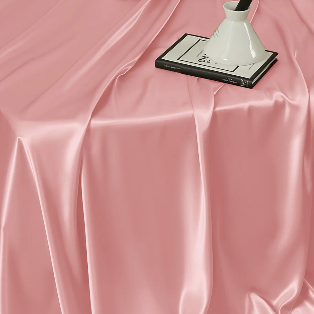 Close up texture of pink silk flat sheet