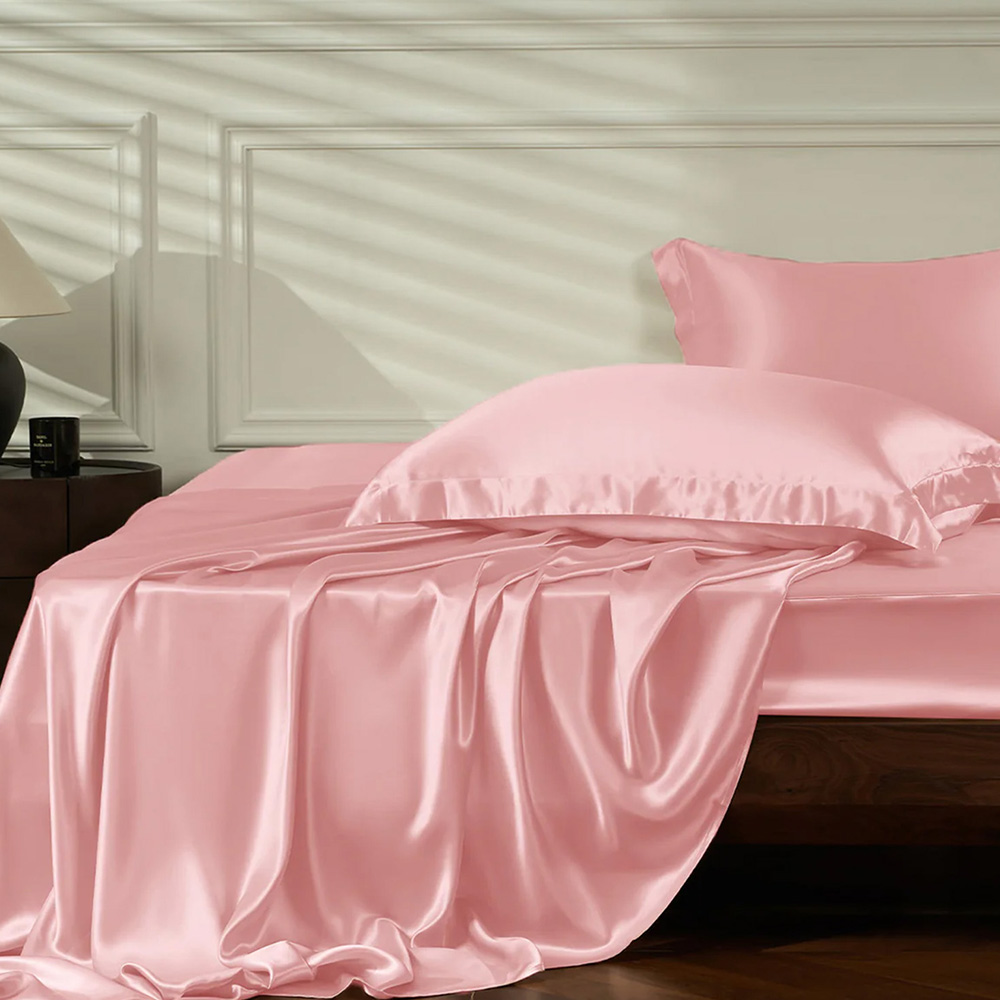 Pink silk bed sheets and pillowcases